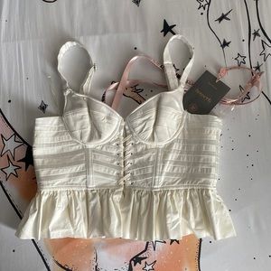 Beautiful corset, new with tags. Color: off white